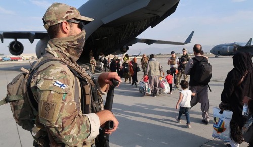 SOF and Royal Marines extracting Tiny Afghans.