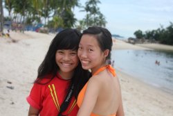 gurururururu:  Bright orange bikini top.