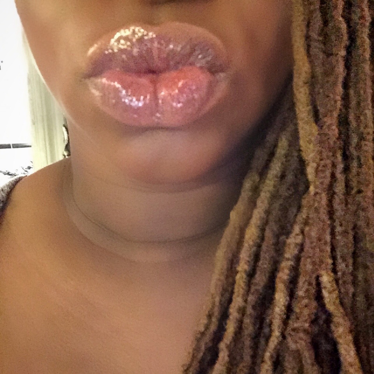 missprimproper:  A very shiny, lip glossy kiss to you all. Happy New Year!