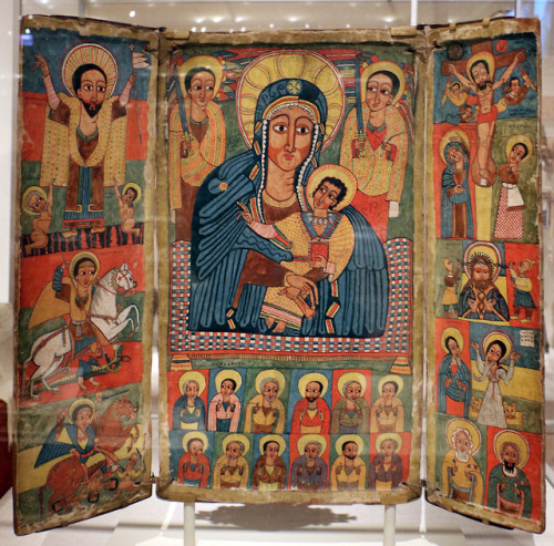 Ethiopian triptych depicting the Madonna and Child flanked by saints.  Artist unknown; reign of Iyas