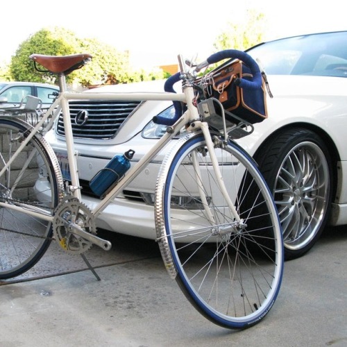 Something I built from ground-up a while back. A Schwinn Voyager restored in Lexus Crystal White Pea