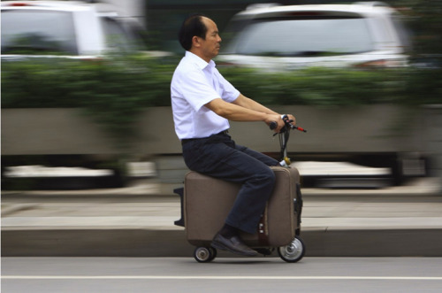 2120. Suitcase Scooter. A man in China spent 10 years modifying his suitcase to turn it into a scoot