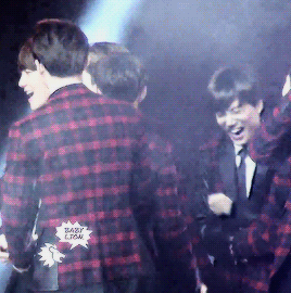 kyungsol: jongin grabbing kyungsoo by the waist what resulted in kyungsoo punching