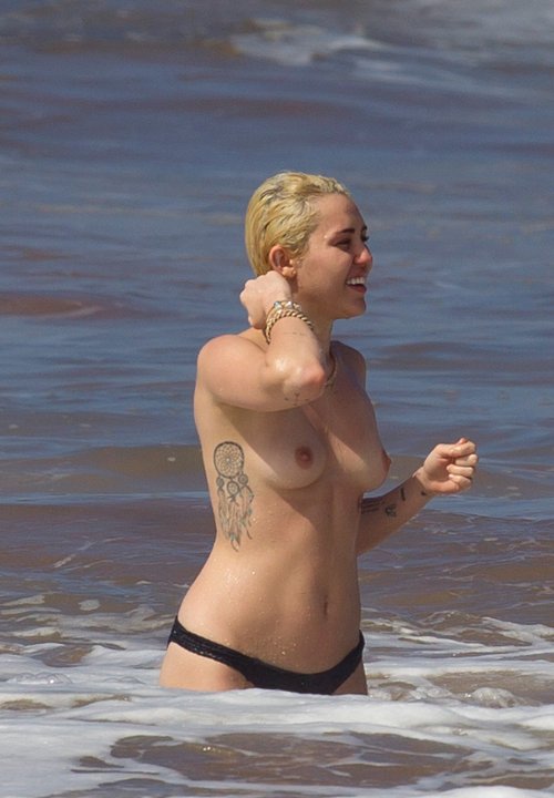 hotcelebshd:  Miley Cyrus Topless in Hawaii HQ Pictures ALL PICTURES: Click 