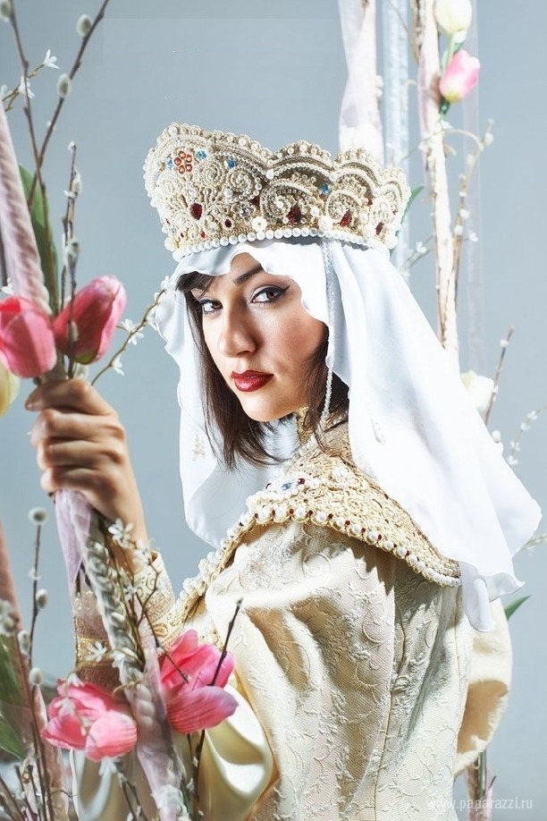 sensualspectrum:  Sasha Grey on a swing in a traditional Russian kokoshnik and costume