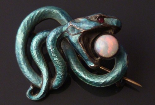 cair–paravel:Meyle & Mayer snake brooch, c. 1900. Silver, enamel, and opal snake brooch.