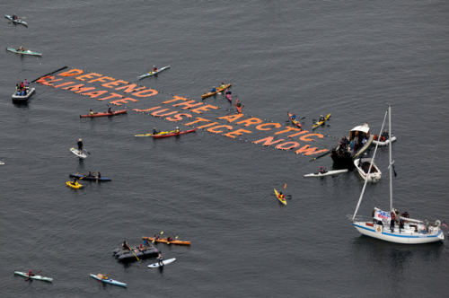 micdotcom:  Awesome photos show the “Shell No” kayak protest in Seattle this weekend This Saturday, hundreds of environmental activists turned out in Seattle to celebrate a day-long festival called the “Paddle in Seattle” and protest Royal Dutch