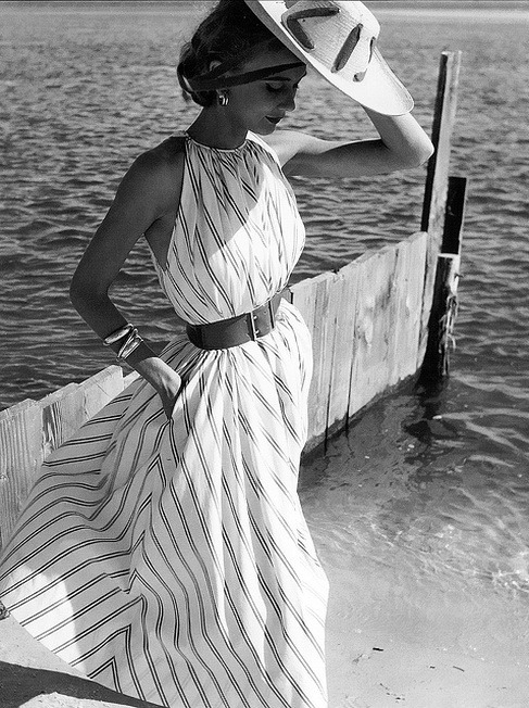 Helen Beatty wearing a dress by Claire McCardell for Mademoiselle, Oak Beach, New York, 1951. Photo 