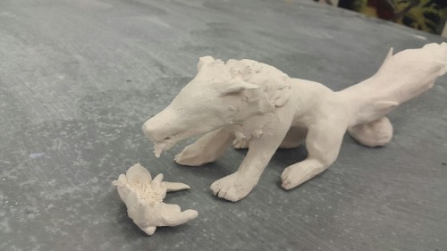 Head And Body Of A Wolf But A Venus Fly Trap For A Tail. The Wolf Is Eating The Bunny And The Tail Is