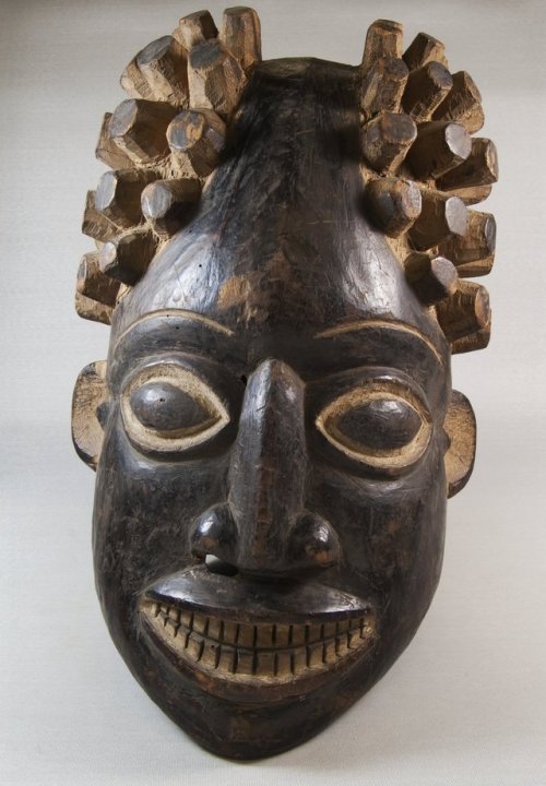 Painted wooden mask of the Tikar people, of the Grasslands region of present-day Cameroon.  Artist u