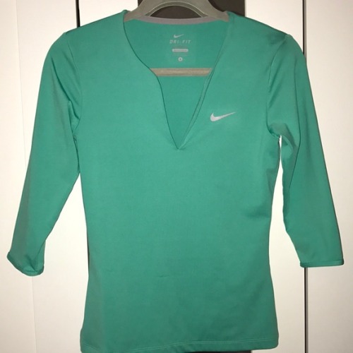 I just added this listing on Poshmark: Nike dri-fit green v neck womens shirt. poshmark.com/