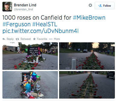 socialjusticekoolaid:  What they won’t show you on CNN tonight: Ferguson residents line a parade of roses down W Florissant, leading to where Mike Brown was taken from this world. #staywoke #powerful #insolidarity  