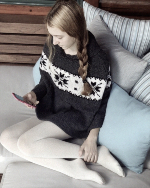 Knitted wool sweater and white wool tights