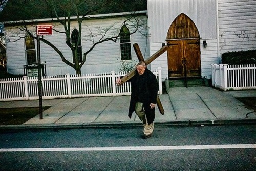 Reverend David Jolly carrying the cross down City Island Ave. on Good Friday.#photography #photostor