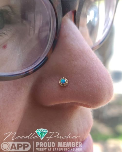 This beautiful nostril piercing is healing great and finally got the downsizing it deserved! Purity 