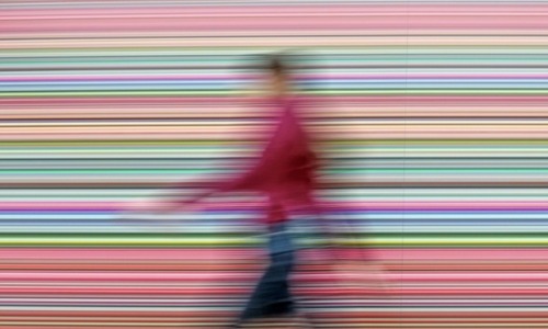 sonjabarbaric: A woman walks in front of Gerhard Richter’s painting titled Strip during the pr