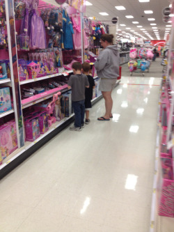 scribbles-and-slash:  I usually don’t take pictures of strangers and post them online but… Today at Target this lady was being dragged by her two sons into the toy aisle and since I was looking at Transformers I happened to see them go by. These boys