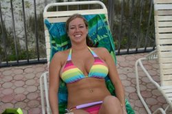 brothersister69:  My sister always looks good in her striped bikini.  But she looks even better out of it.