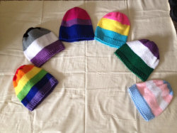 fandomsandfeminism:  floweredprouvaire:  hey guys!!so my mom has a shop on Etsy where she usually makes fandom related things - gloves, pillows, shoulder bags, etc., but she recently decided to start making pride beanies!! the ones pictured in the first