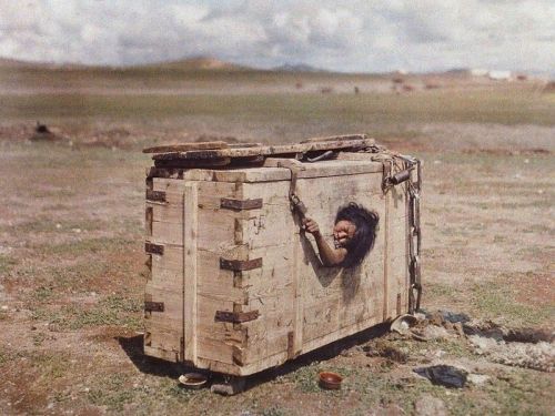 This is dark. A Mongolian women left to die in a starvation box. Its horrific. The colourised photo 