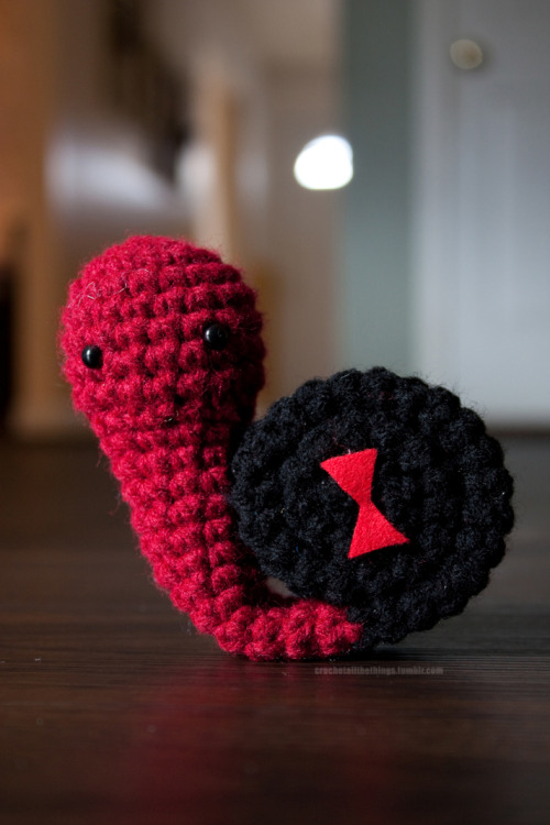 thingsfortwwings:[Photoset: Crocheted snails with costumes based on the MCU Avengers + Nick Fury and