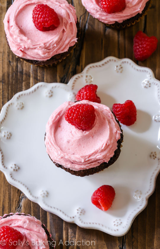 sweetoothgirl:  Chocolate Cupcakes with Creamy Raspberry Frosting
