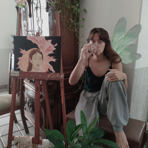 me drinking water next to my Jisoo painting.wednesday, march 10th 2021.