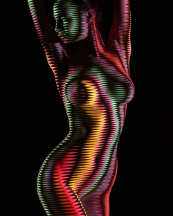 jedavu:    Photographer Dresses Nude Women In Light And Shadows   Photos taken by Dani Olivier  