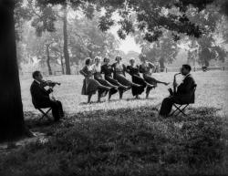 thats-the-way-it-was: June 15, 1932: Actresses from the Prince of Wales Theatre in London dance in Hyde Park accompanied by a saxophone and a violin.  Photo: Fox Photos 