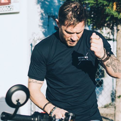 gray-firearms:  sturmgewehrr:  tomhardyvariations: FIYAH … From @brother_moto on Instagram ~ “Honored to have Mad Max himself stop in for some shop talk and espresso. Keep the rubber side down🤘”   Unf   I wanna ride with him