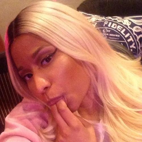 Looks like Nicki is licking her fingers before inserting them into her puss! Nice.