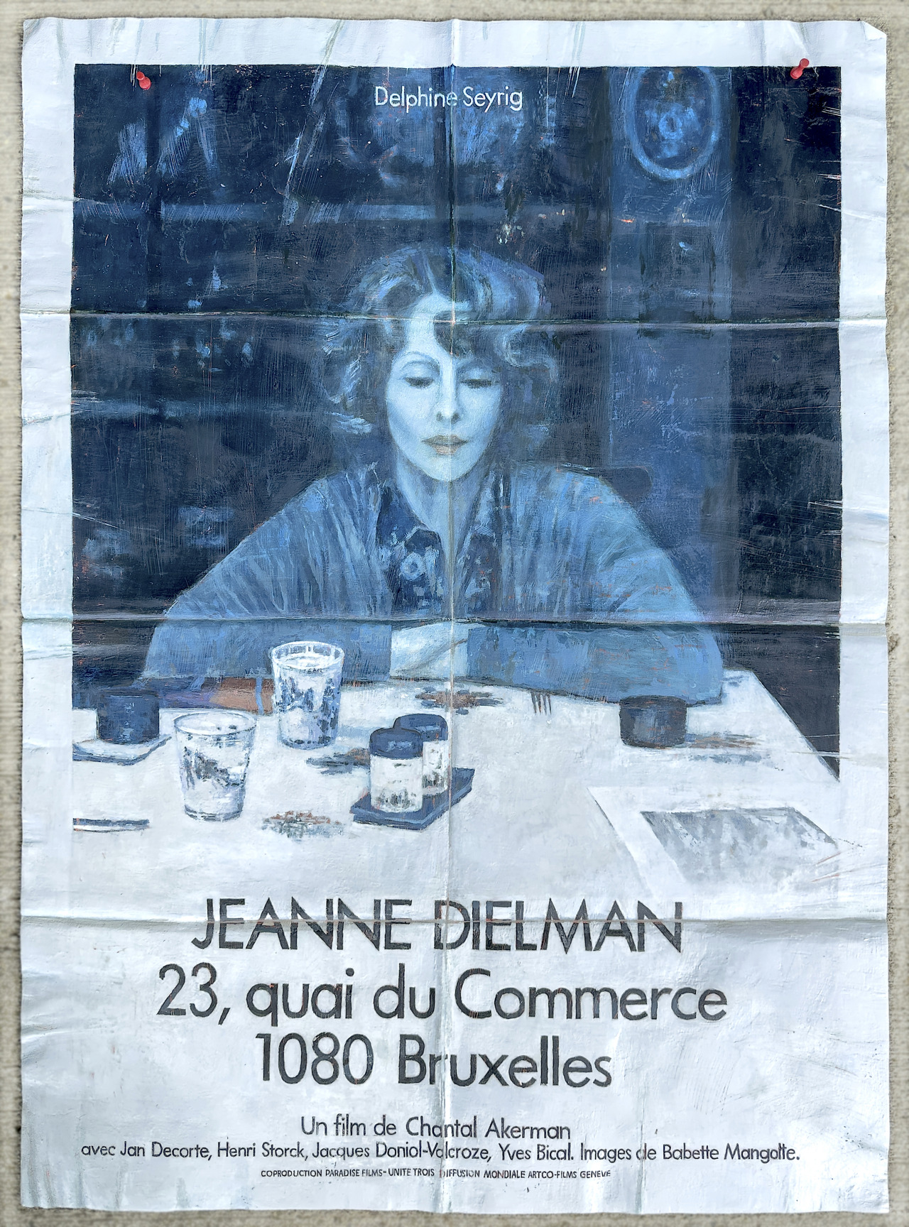 Untitled Project: Poster [Jeanne Dielman, 23 quai du Commerce 1080 Bruxelles - Un film de Chantal Akerman], Oil paint on carved wood, 48 x 34 x 1 ½ inches, 2023
>> a hand-carved and painted wood sculpture based on the original film poster of Chantal...