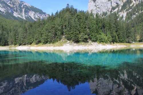 opticallyaroused:  Green lake in Austria ___________________ Grüner See (Green Lake) is a lake in Styria, Austria near the town of Tragöß. The lake is surrounded by the Hochschwab mountains and forests. The name “Green Lake” originated because