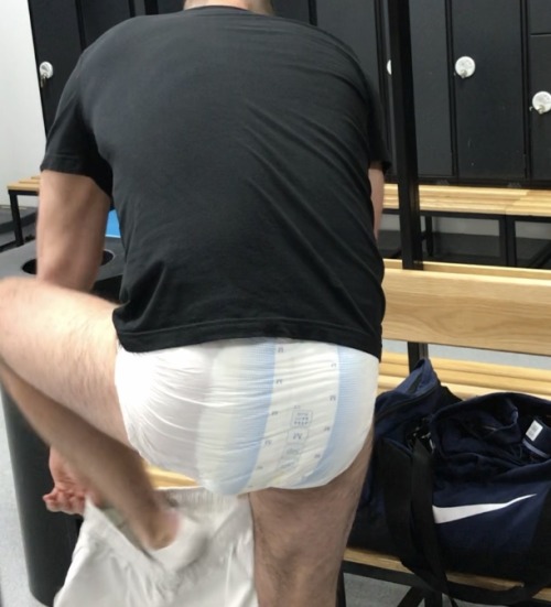 thedlofomaha:Incontinent guy at my gym pulling on his white cotton rugby shorts over his Tena Slip b