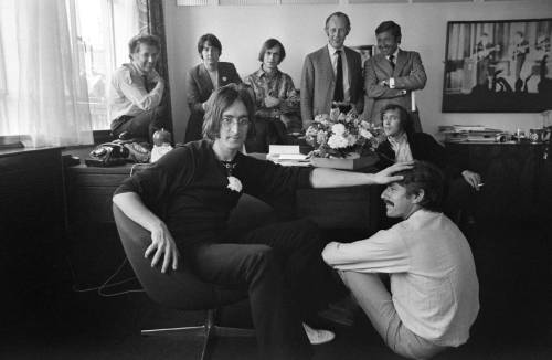 John Lennon And Paul McCartney With Beatles Associates (Peter Brown, Derek Taylor, Neil Aspinall) In