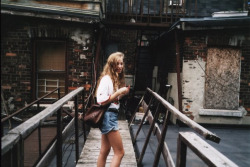 daizeh:  rookiemag:  Forever Young “This is me on a rooftop I snuck onto in Toronto. This was grade nine, the first year I really started documenting my life in photos.” While cleaning out her computer, Petra found a bunch of photos she took in high