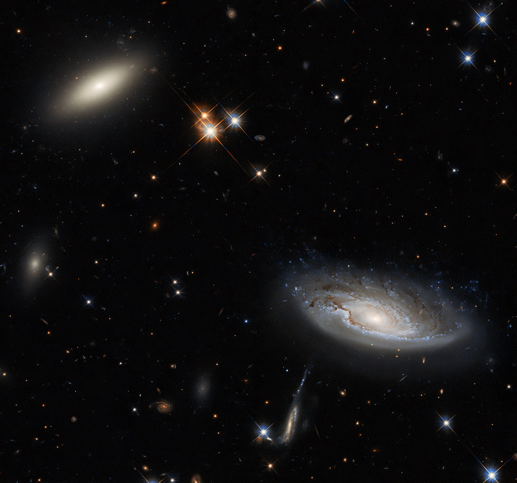 Hubble Glimpses a Galactic Duo by NASA Hubble