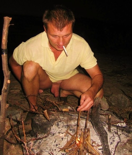 campingmen:  Love the warm glow of the campfire in these pics. http://campingmen.tumblr.com/ 