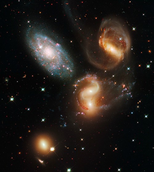 just–space:  Stephans Quintet. Four galaxies merging into one  js