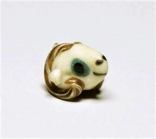 historyarchaeologyartefacts - Tiny glass ram with a sweet smile...