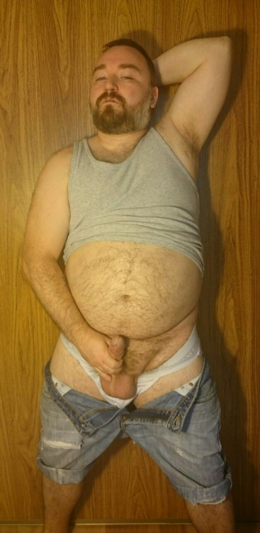 cuddlecubottawa:  I had a request for seeing me model in my favourite outfit. Somehow if was deleted but I took some pics anyways. This tank top is a bit tight around the belly, it makes me feel fat and I like that. These Jean shorts are probably the