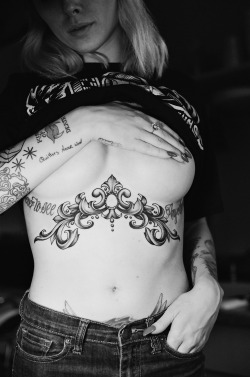 alysha:  photo taken by Tim Hendricks right after we finished my new breast plate tattoo. 