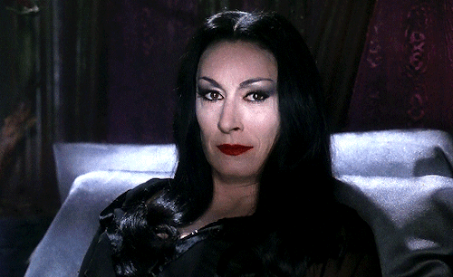 filmgifs:I would die for her. I would kill for her. Either way, what bliss. The Addams Family (1991) dir. Barry Sonnenfeld