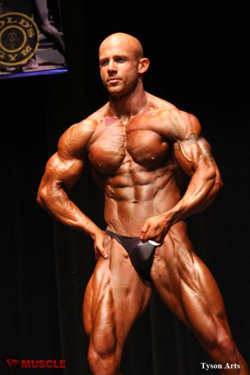 muscledlust:  Mmm…  lusting here.  Bald, handsome, sticky out ears, narrow waist, and ripped bod.  I want him.