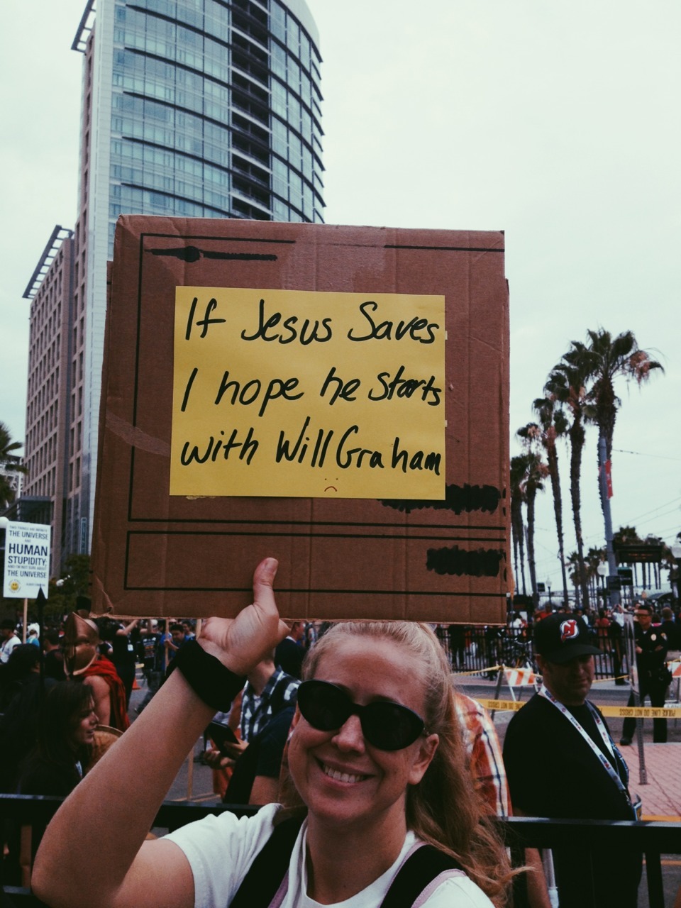 thecityofpaper:  this lady was standing outside of comic con with all the crazy religious