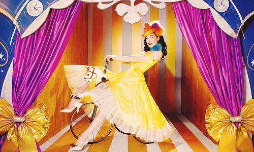 :  Dita Von Teese in a circus-themed photoshoot for Plastic Dreams magazine. 