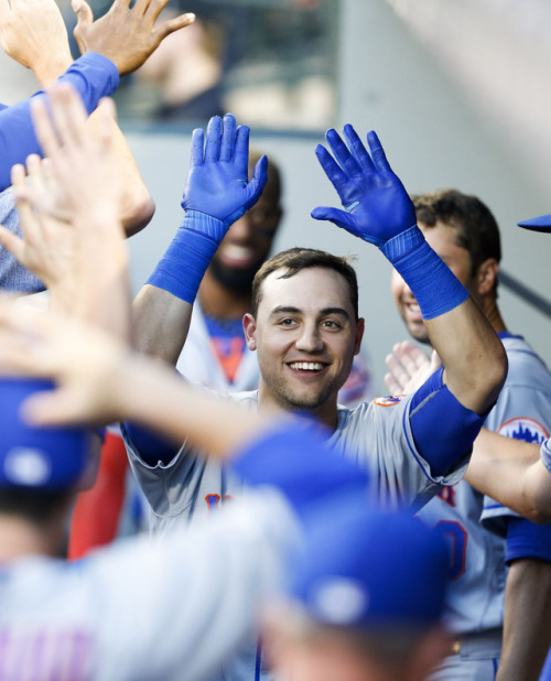 harveydegrom:New York Mets center fielder Michael Conforto celebrates in the dugout after hitting a solo homer against the Seattle Mariners on July 28, 2017 during the third inning at Safeco Field. (Credit: Joe Nicholson / USA TODAY Sports)