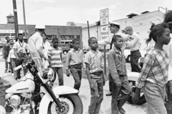 choice36c:  Police lead a group of African-American school children off to jail following their arrest for protesting against racial discrimination in Birmingham, Alabama. May 4, 1963.