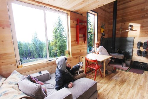fuzzyimages:  tinyhouseamerica:  iwansfvs:  nice little selfmade house  No offense OP but I hate not having sources on posts http://tinyhousetalk.com/young-couples-diy-off-grid-micro-cabin/  I reblogged earlier. This is better. Much better. Thanks for