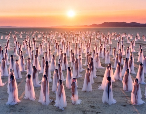 wetheurban:  PHOTOGRAPHY: Nude Landscape Portraits by Spencer Tunick Spencer Tunick stages scenes in which the battle of nature against culture is played out against various backdrops, from civic center to desert sandstorm, man and woman are returned